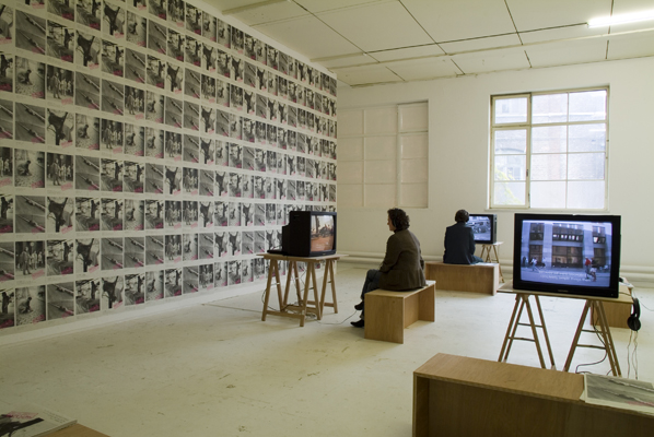 'REPLACED – BRNO – 2006'. Five channel video installation and posters on paper, Installation view, Barrack, HISK Antwerp. Photo: Dirk Pauwels.