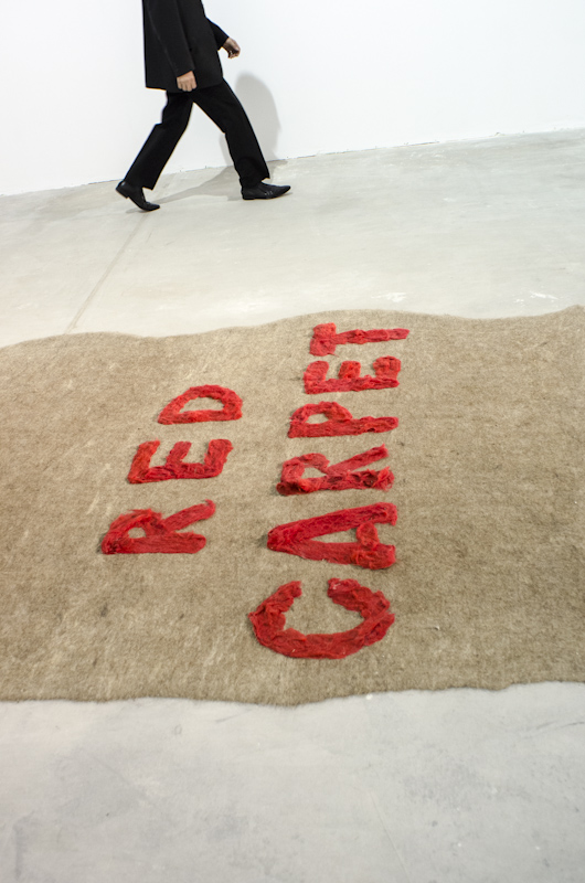 Yelena and Viktor Vorobyev's <em>Red Carpet</em> (2009-12, felt installation, 1.5 x 2 x 10 m) ironized on the glamor associated with contemporary art, especially as it is often perceived in post-Soviet countries like Ukraine, at events like ARSENALE. Image courtesy of the author. 