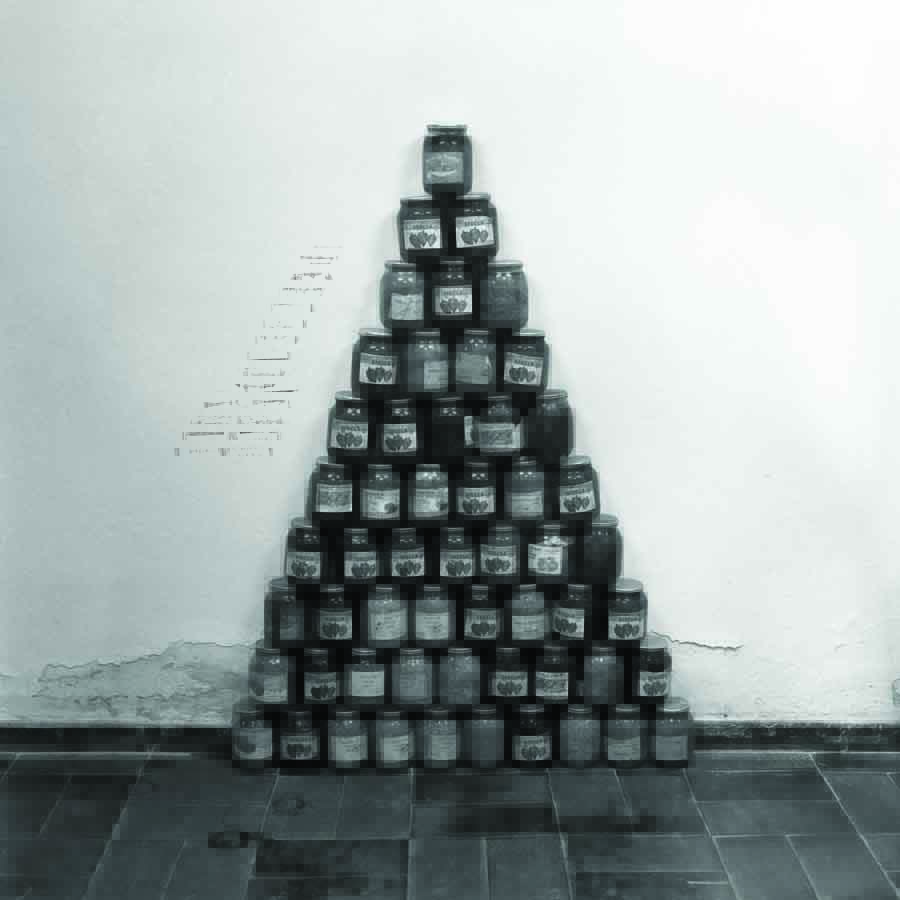 subREAL. "Alimentara," February 1991, installation detail, pyramid made of jars with pickled vegetables. Orizont Gallery, Bucharest. Image courtesy of subREAL.