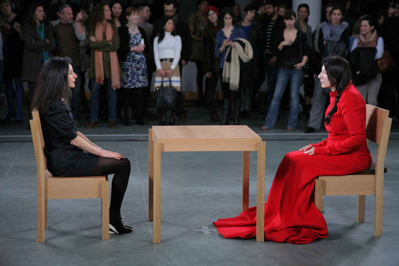 Installation view of Marina Abramović’s performance ‘The Artist Is Present’ at The Museum of Modern Art, 2010. Photo by Scott Rudd. © 2010 Marina Abramović. Courtesy the artist and Sean Kelly Gallery/Artists Rights Society (ARS), New York.