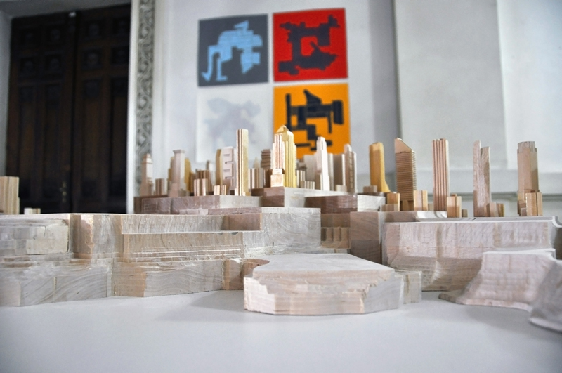 Lan Tuazon, ‘Riot City,’ 2010, sculpture, 200 x 100 x 35cm, ‘Parking Lot Landscape,’ 2010, woodblock print, ink on paper. Image courtesy of Bucharest Biennale 4. 