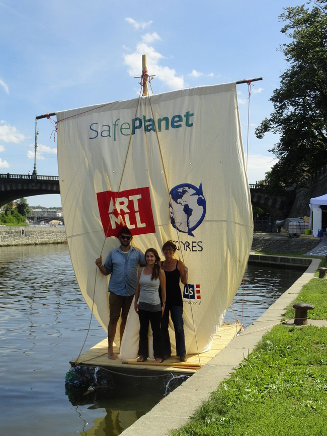 Art Dialogue’s “Ahoy Project,” with Barbara Benish (right) preparing to float down the Vltava River, 2012. Image courtesy of ArtMill.