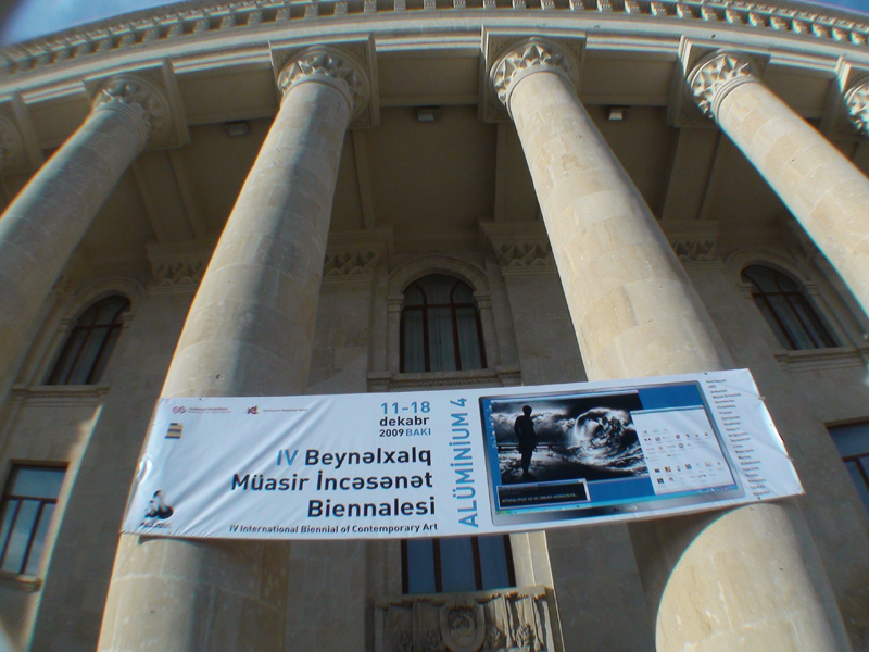 Banner of the 4th Baku Biennale on the colonnade of museum center. Image courtesy of the Baku Biennale. 
