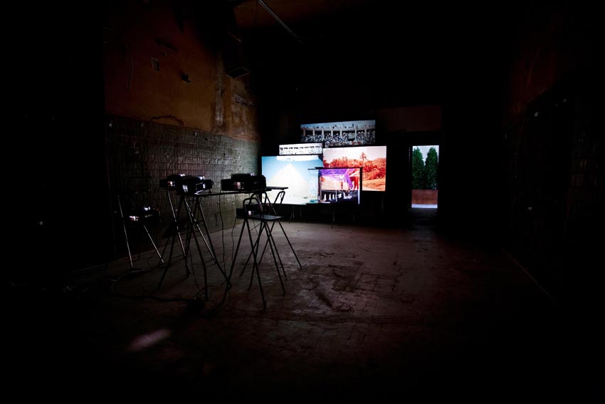 Vesna Pavlovi?, <em>Search for Landscapes</em>, photographic installation, size variable, 2010. Installation view from Bucharest Biennale 5, The House of the Free Press. (In the background work by Abbas Akhavan). Photo: Radu Tudoroiu. Courtesy of BB5.
