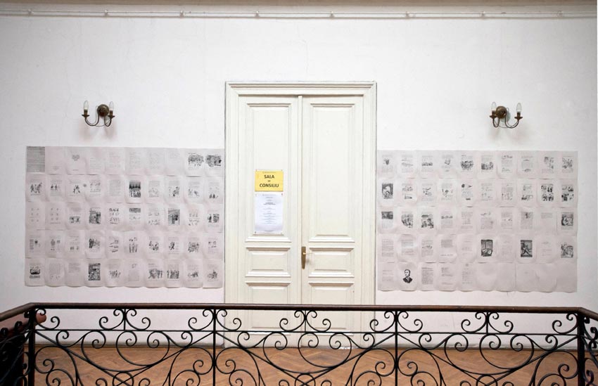 Ciprian Homorodean, <em>Take the Book, Take the Money, Run!</em>, 100-page, handmade book, ink on paper, 32,4 x 24,4 cm., 2010. Installation view from Bucharest Biennale 5, The Institute for Political Research. Photo: Radu Tudoroiu. Courtesy of BB5.