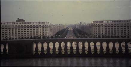 Looking east from the House of Parliament, onto a region of the city subjected to Ceausescu's reconstruction. This view seems designed to evoke the view from the papal loggia in St. Peter's. Author's photograph, 1999.