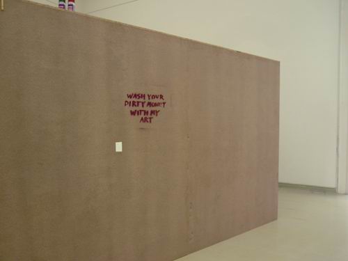 The stencil at the exhibition 'What's up?', on the wall of the box of SZAF, Kunsthalle, Budapest, 2008. Photo courtesy of János Sugár.