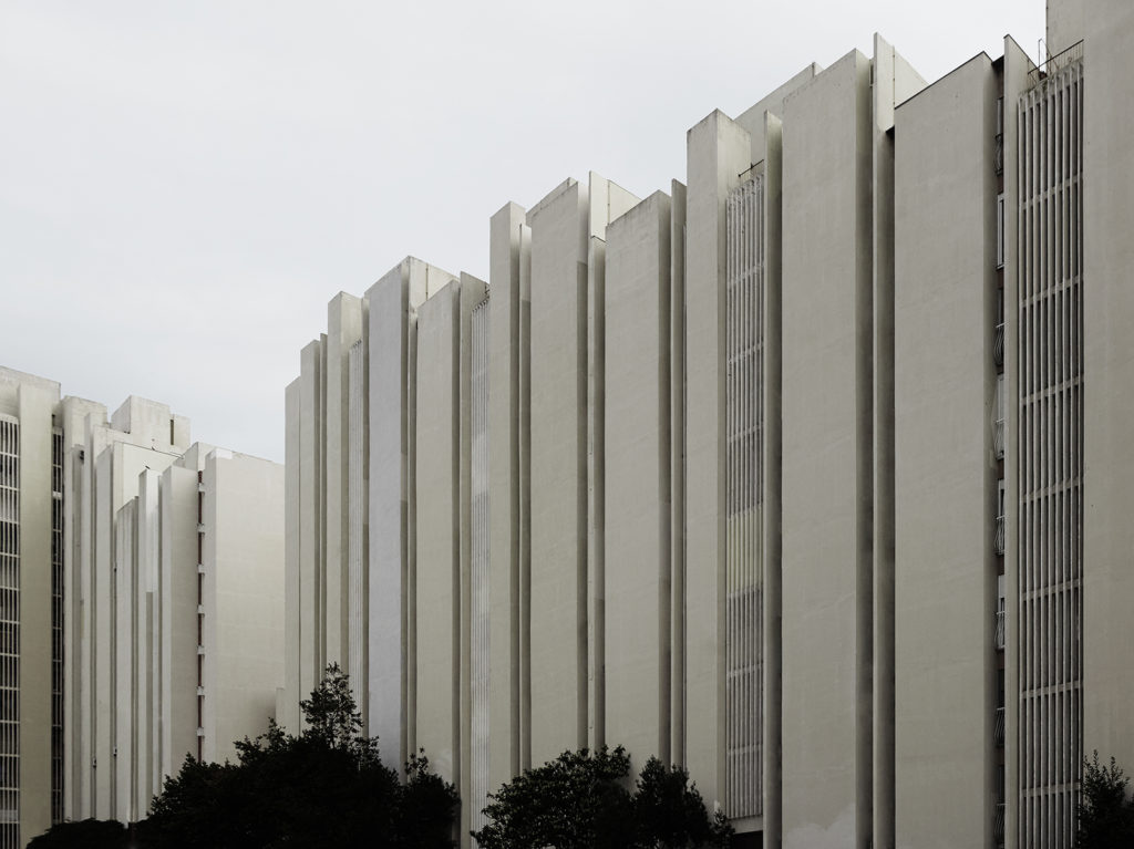 Facade of a white, angular building.