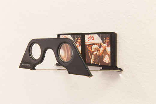 Black viewfinder with photograph behind.