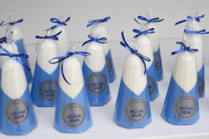 cones of sugar with blue labels and ribbons