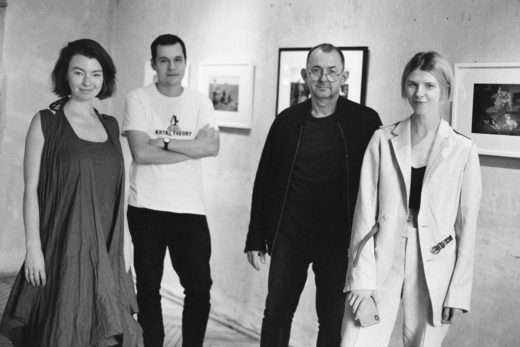 A black and white photo showing the curators and artist of the Ukrainian Pavilion at the 59th Venice Biennial
