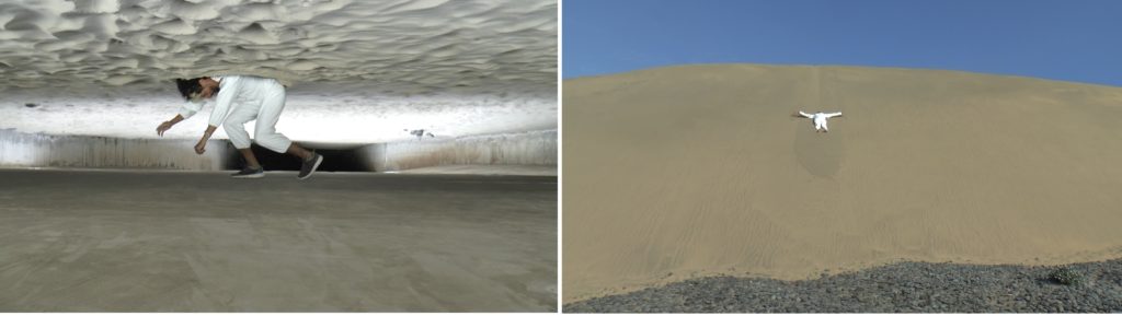 Two stills from a video, showing a person in white. In one image, the person appears to have fallen upwards into a ceiling of sand; in the other the person is lying on what appears to be a sandy hill
