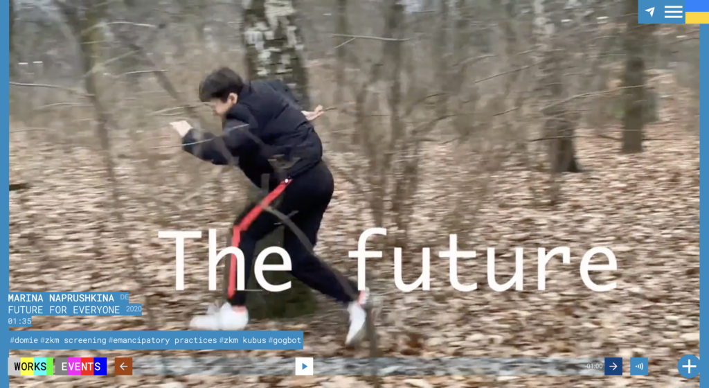 A man wearing a black jacket, black pants with a red stripe, and white sneakers running in the woods. The words 'The Future' are superimposed over the image.